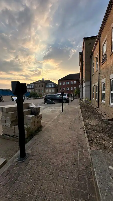 EV charging posts beside parking spaces in Epping