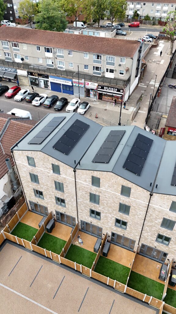Aerial view of the Main Avenue development, showing solar panels and rear gardens